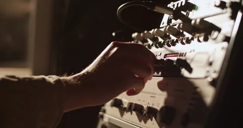 Musician tuning amplifier in studio Stock Footage 201850729