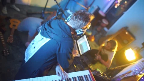 The musician turns on a computer program while recording a new album Video stock 115064919