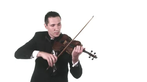 Musician in tuxedo performs a slow composition on a classical violin. Isolated Stock Footage 134495486