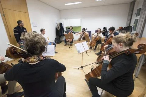  musicians and their instruments at a classical music orchestra rehearsal ... Stock Photos