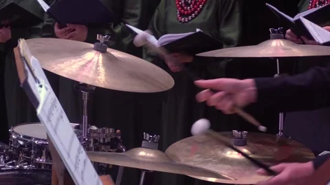 The musician's drummer's hands turn the notes at a concert. Percussion Stock-Footage 158708025