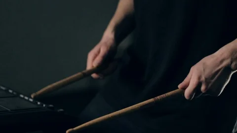Musician's hands play on electronic pads with drumsticks Video stock 90837962