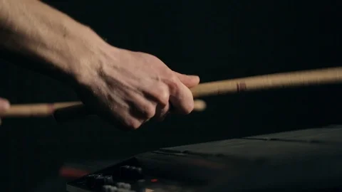 Musician's hands play on electronic pads with drumsticks Video stock 90998699
