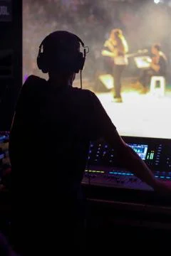 Musicians, operator and console. Stock Photos