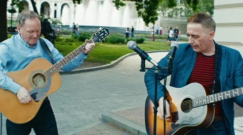 Musicians perform on the street Stock Footage 63942840