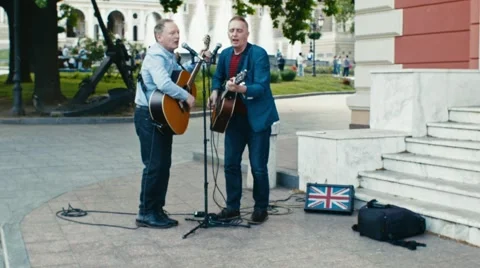 Musicians perform on the street Stock Footage 63946445