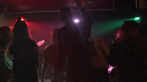 Musicians performing and audience dancing in night club 動画素材 50663025