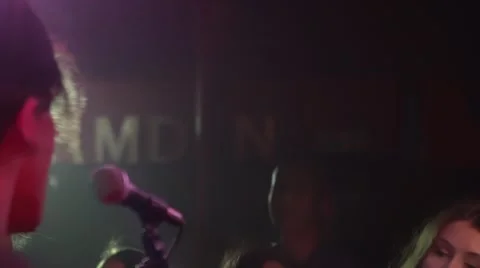 Musicians performing and audience dancing in night club Stock-Footage 50663807