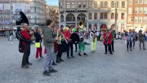 Musicians performing on Dam Square Stock Footage 320454566