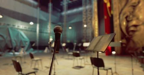 Musicians prepare for a performance in an empty concert hall 스톡 일러스트