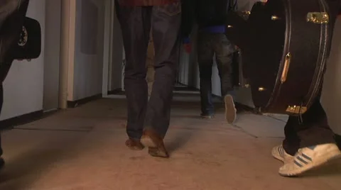 Musicians walking Stock Footage 10919028