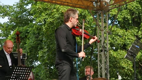 Musicians at work Stock Footage 137865874