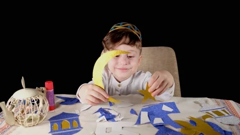 Muslim child playing Stock Footage 174411084