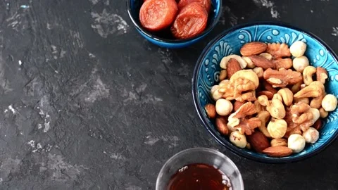 Muslim fasting, completion of fasting, tea, dried fruits nuts Stock Footage 150948941