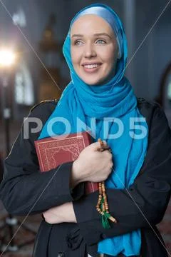 Muslim girl with Holy Book Koran Muslim girl with Holy Book Koran ...