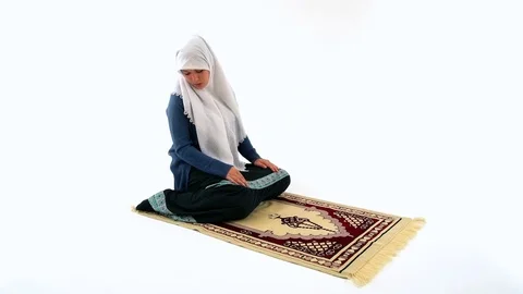 Muslim Girl Praying on Carpet in Namaz o... | Stock Video | Pond5