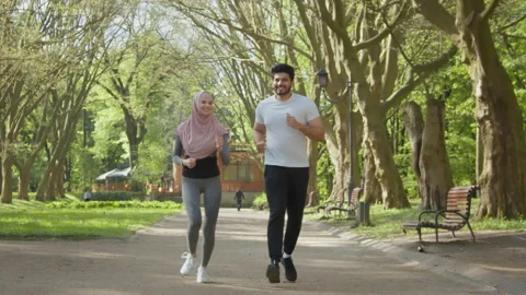 muslim-man-and-woman-run-footage-157929008_iconl.jpeg