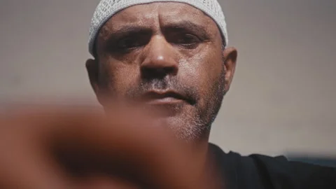 Muslim man with a beard looking straight at camera Stock Footage 275309908