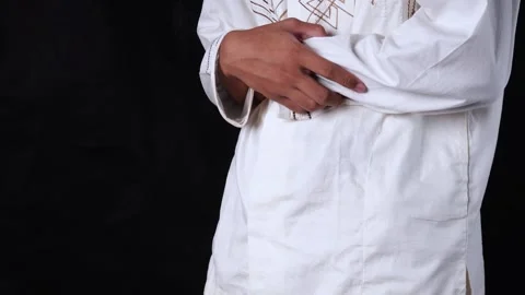 Muslim Man Doing Praying Movement or Salat With Isolated Black Background Stock Footage 267933967