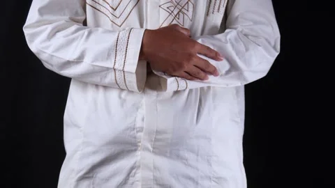 Muslim Man Doing Praying or Salat With Isolated Dark Background Stock Footage 267933966