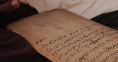 Muslim man practicing Islamic calligraphy in Mali, West Africa - color corrected Stock Footage 261850596