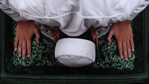 Muslim Man Praying On Prostration Position On Mat Or Carpet Stock Footage 267934090