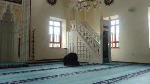 Muslim man prays alone in a small mosque in istanbul Stock Footage 86038829