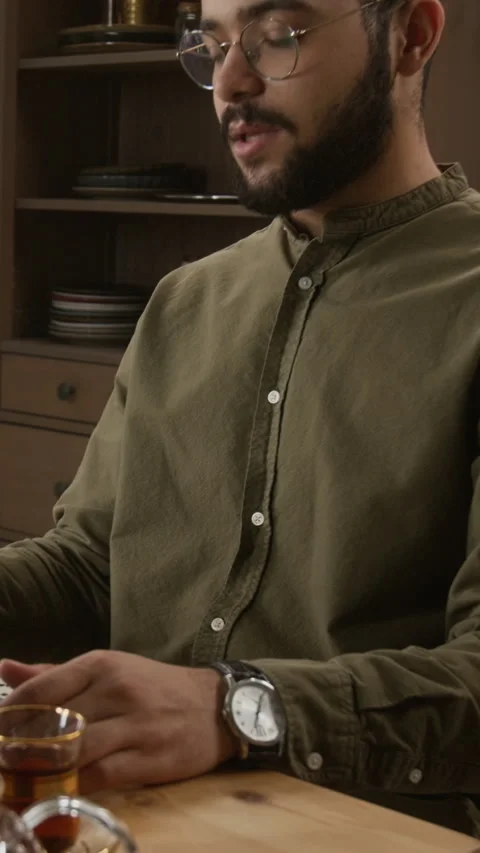 Muslim Man Using Computer for Online Meeting Vertical Stock Footage 331817524