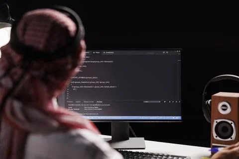 Muslim man using a desktop computer Stock Photos
