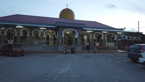 Muslim men congregate in a mosque for evening prayer (salah)  in Malaysia. Stock Footage 105369951