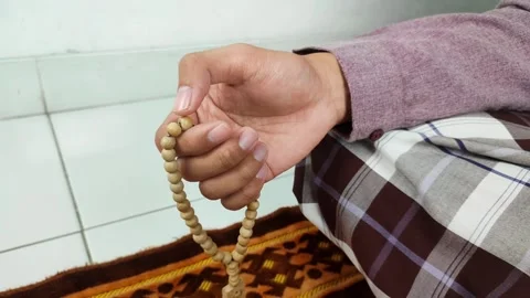 Muslim men dhikr using prayer beads Stock Footage 293601606