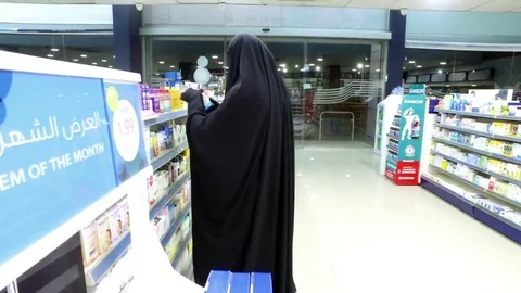 The Muslim in Nikaba in the Pharmacy. Stock Footage 76246407