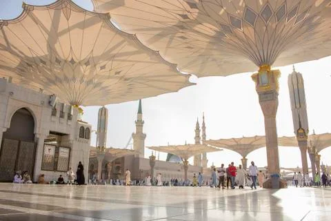 Muslim pilgrims visiting the beautiful Nabawi Mosque, the Prophet mosque Stock Photos