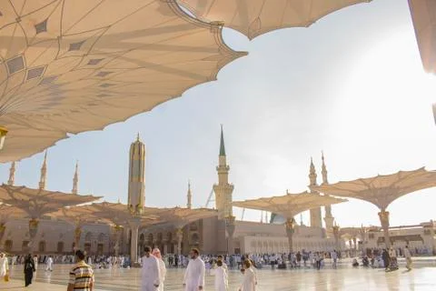 Muslim pilgrims visiting the beautiful Nabawi Mosque, the Prophet mosque Stock Photos