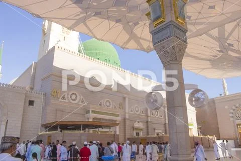 Muslim pilgrims visiting the beautiful Nabawi Mosque, the Prophet mosque Stock Photos
