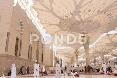 Muslim pilgrims visiting the beautiful Nabawi Mosque, the Prophet mosque Stock Photos