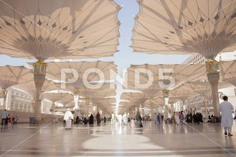 Muslim pilgrims visiting the beautiful Nabawi Mosque, the Prophet mosque Stock Photos