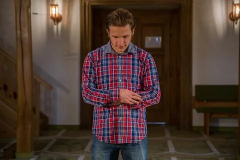 Muslim praying in a mosque Stock Photos