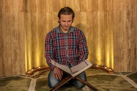 Muslim praying in a mosque Stock Photos