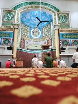 Muslim praying in mosque Stock Photos