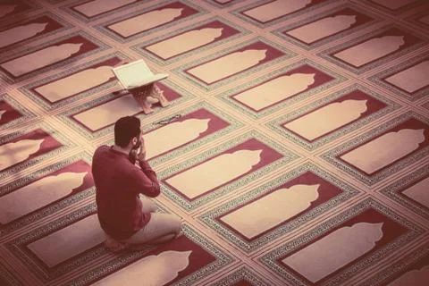 Muslim praying Stock Photos