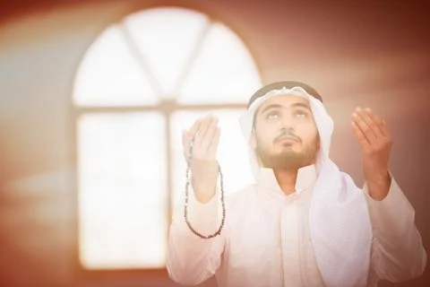 Muslim praying Stock Photos