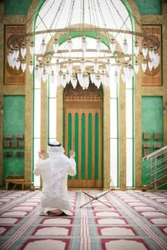 Muslim praying Stock Photos
