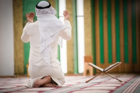 Muslim praying Stock Photos