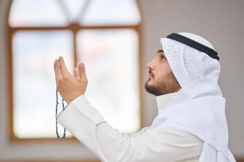 Muslim praying Stock Photos