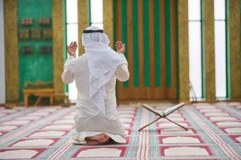 Muslim praying Stock Photos