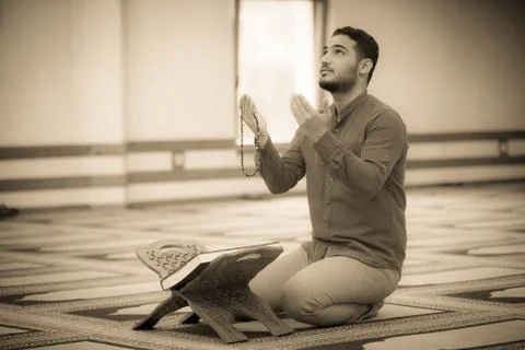 Muslim praying Stock Photos