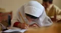 Muslim Schoolgirl doing her Classwork HD Footage
