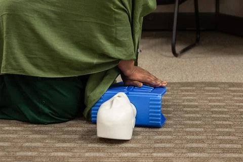 Muslim trainees taking cpr class and first aid Stock Photos