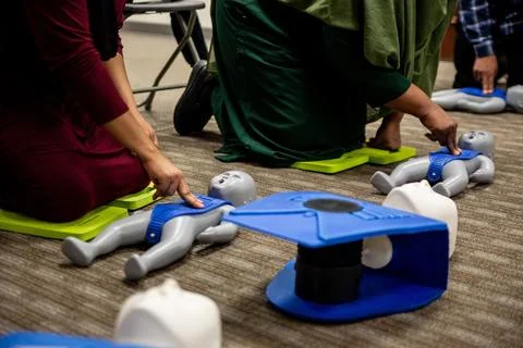 Muslim trainees taking cpr class and first aid Stock Photos